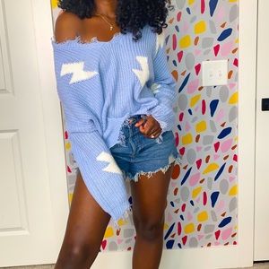 Oversized ripped light blue sweater